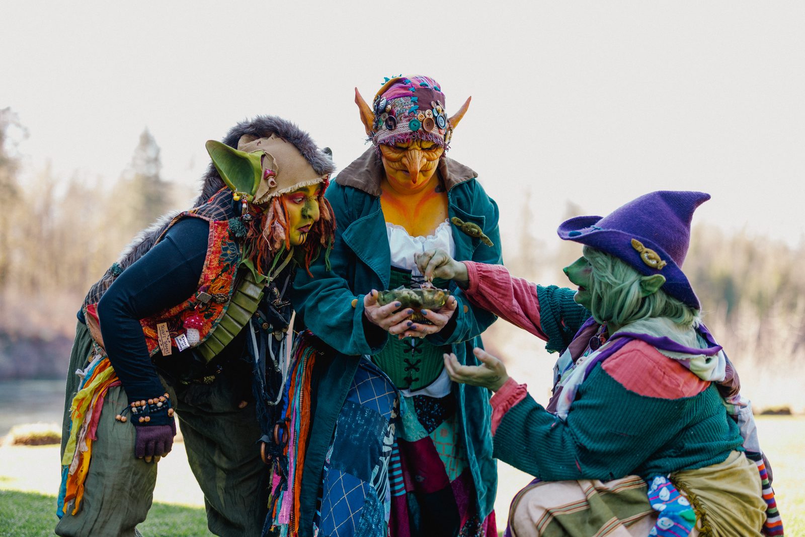 Goblin trio looking at an orb